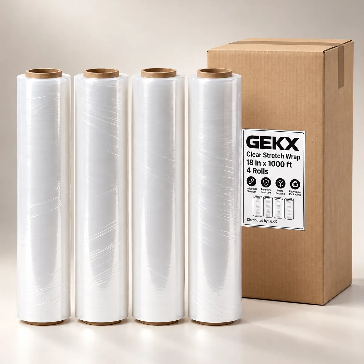 Four GEKX clear stretch wrap rolls standing beside a closed GEKX 4-roll shipping box on a light background